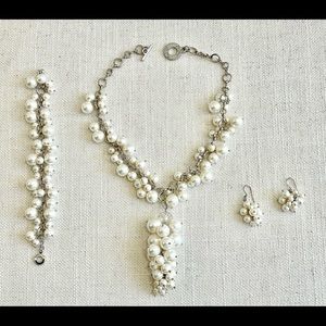 Set of pearl jewelries-necklace, earrings, bracelet.